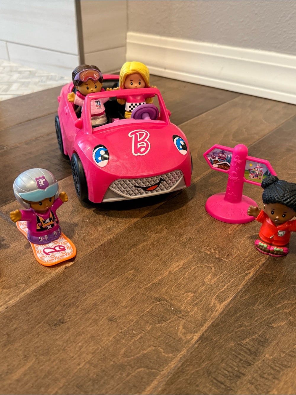 Barbie Pink Convertible Car Playset with Four Mini Dolls and Accessories